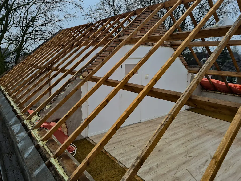 Ridge of remediated dwelling house. Roof boarding completely removed.